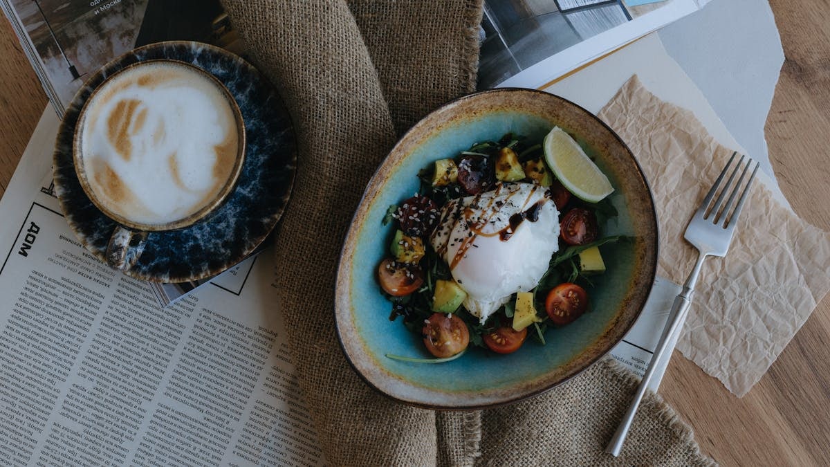 Artistic top view of gourmet meal with coffee. Perfect for food photography.